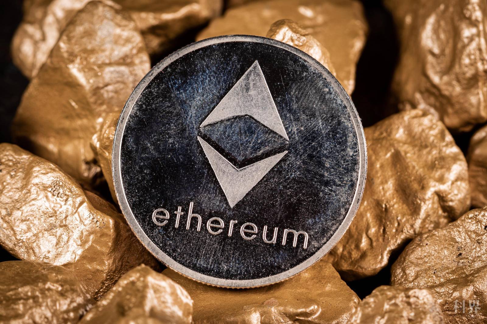 Ethereum cryptocurrency with gold nuggets. Investment and store of value concept.