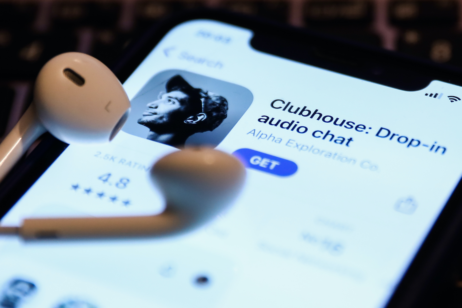 Clubhouse Drop-in audio chat app logo on the App Store is seen displayed on a phone screen in this illustration photo taken in Krakow, Poland on April 6, 2021.(Photo Illustration by Jakub Porzycki/NurPhoto via Getty Images)